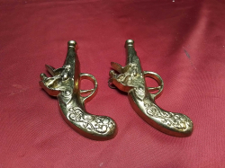 A Pair of Brass Decorative  Pistols. L.15 Cm.