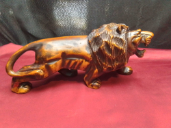 A Beautifully Carved Wood Majestic Lion 32Cm Long 15 Cm. High. A Lovely Sculpture. 