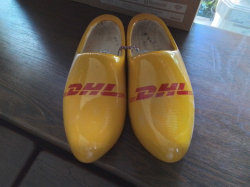 A Pair of 43 to 44 DHL Wooden Clogs.