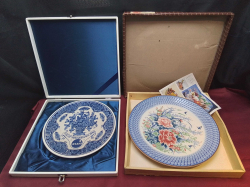 2 boxed Plates. 