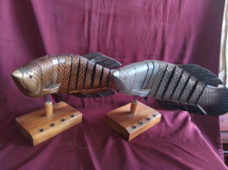 A Pair of Wooden Articulated Fish on Stand. L.42 H.24 cm