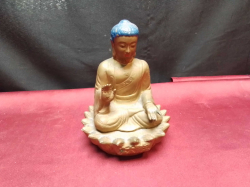 A lovely buddha sit on a lotus leaf. W.10 H.15 Cm. 