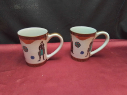 A pair of very large highly collectable mugs marks to base 