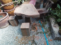 A Heavy Stone Out door Table  W.67 L.85 H.66 Cm. With 3 Stools.