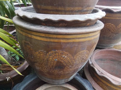 A Large Pottery Plant Pot with tray.