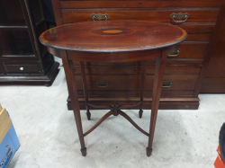 Late Victorian C.1895 mahogany inlaid oval occasional table. Stamp with numbers under top
Probably made by Gillows. W.48 L.70 H.73 Cm.