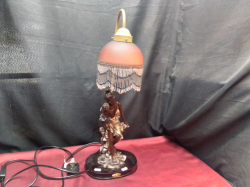 A Large Figure Metal Lamp with original Beaded Fringe Shade. W.22 H.60 Cm.