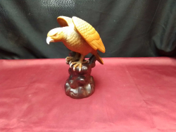 A vintage porcelain eagle made in Italy ( stamped). W.12 H.24 Cm.  