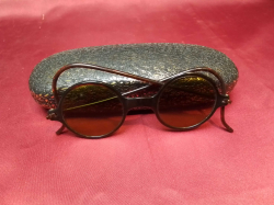 A pair of vintage sunglasses 1920’s