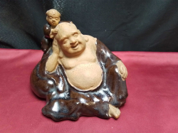 Happy buddha with boy figure signed to base. D.15 W.20 H.15 Cm.