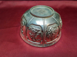 A silver plated bowl mark to base showing Chinese figures. W.12 H.6 Cm.  