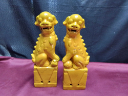 A large old pair of Chinese foo dogs with marks to bases. W.9 D.6 H.26 Cm. 