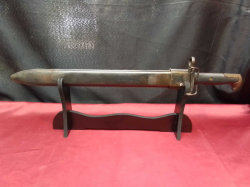 A vintage US bayonet on a stand. W.Cm.  