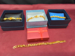 4 Ladies Gold Plated Bracelets in Boxes. 