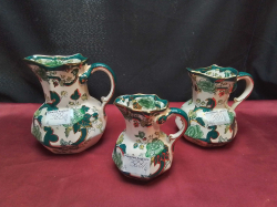 A Set of 3 Graduate Jugs in Masons Chartreuse  Patterns.