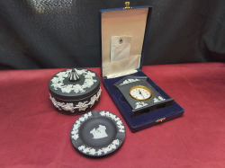 A Rare Black Wedgwood Jasperware Clock in original Box, A Large Black Round Trinket Dish and A Small Dish. 
