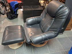 Black Leather reclining chair with rest stool