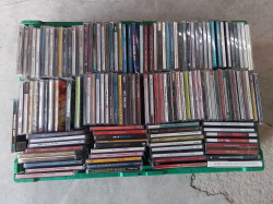 A Box of 135 Assorted CDs.