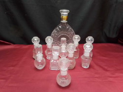 Large Whiskey Decanter with 10 miniature ones. 