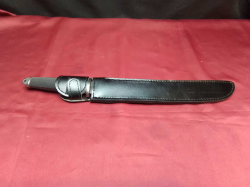 A short sword on leather case. W.46 Cm.  