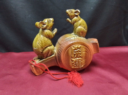 A large Chinese figure of two auspicious rats. W.20 H.18 Cm. 