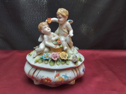 A German Antique  Ceramic Tureen Decoratedwith Cherubs. W.16 H.18 Cm. 
