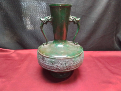 A lovely cast bronze green vase. W.17 H.24Cm. 