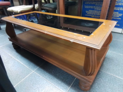 A Nice Wood Framed Coffee Table with a Bottom Shelf and a glass Top. W.56 L.120 H.45 Cm.