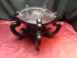 A large vintage carved wooden stand. W.39 H.24 Cm. 