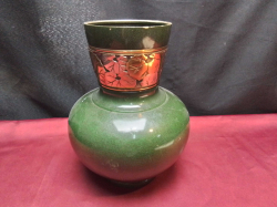 A cast bronze Oriental vase. W.17 H.24 Cm.