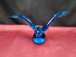 A limited edition blue Murano Glass bird. W.25 H.14 Cm.