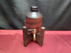 A really nice decorative barrel with a tap on its own stand 