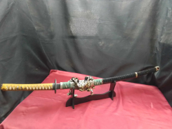 An antique original samurai sword on stand. L.100 Cm. 