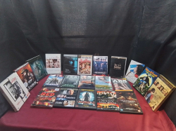 A collection of 21 DVD films some sealed