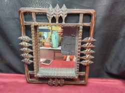 A Vintage wooden mirror. 34x40 Cm.