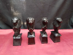 4 Hand  carved Singapore lions. W.4 D.6 H.15 Cm.