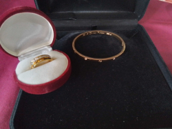 Beautiful gold Plated bracelets and two rings.