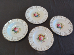 4 Beautiful Crown Derby Plates. ( Mint condition) W.23,26 Cm.