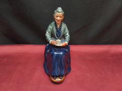 A Royal Doulton Figure of The Cup of Tea HN 2322. W.9 H.17 Cm.