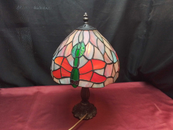 A Pretty Leaded Glass Tiffany Styles Table Lamp.( Working.)25 H.42 Cm.