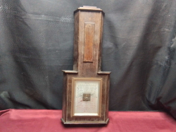 An Oak Baromor. W.23 H.53 Cm.