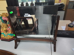 A Small Beveled Glass Mirror. W.51 H.50 Cm.