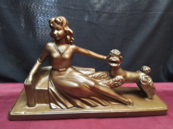 A Very Nice Large Porcelain Art Deco Period  Seated Lady and  Dog on a Stand 48 Cm.  wide. 