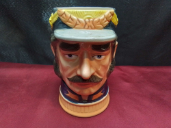 A large vintage musical porcelain character jug European officer, 7 inches high