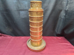 A Wooden Leaning Tower of Pizza. W.19 H.43 Cm.