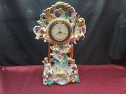A Large Capodimonte Clock. W.26 H.41 Cm. (1 Boy arm A/F)