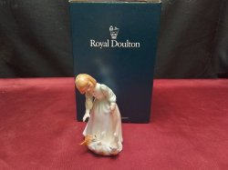 A  Tiny Royal Doulton figurine 