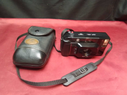 Minolta Camera with case.