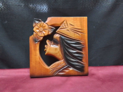 A wooden hand carved ladies face plaque wall hanging  22cm x 23cm