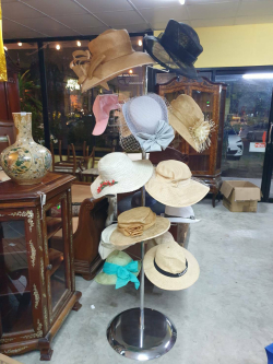 A retro Chrome shop display  hat stand H.186 Cm.with 18 hats and a vintage hat box 